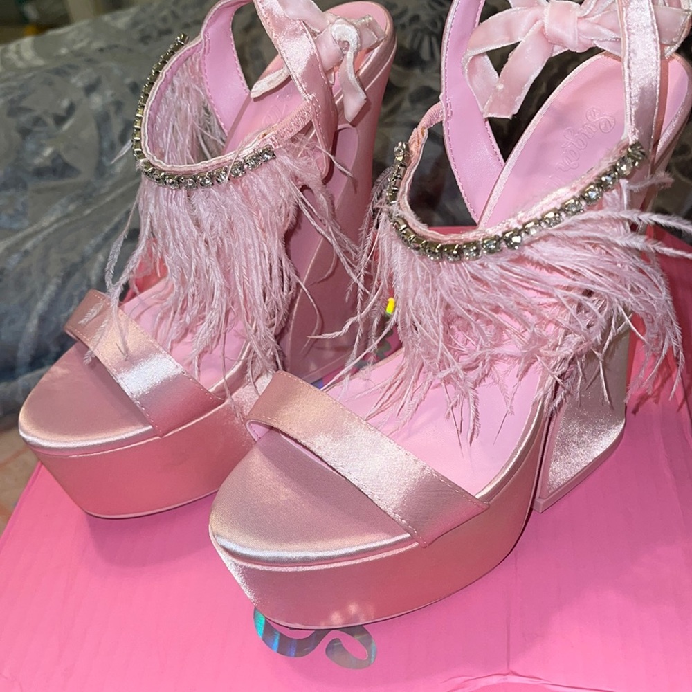 Pink platform glam feather heels